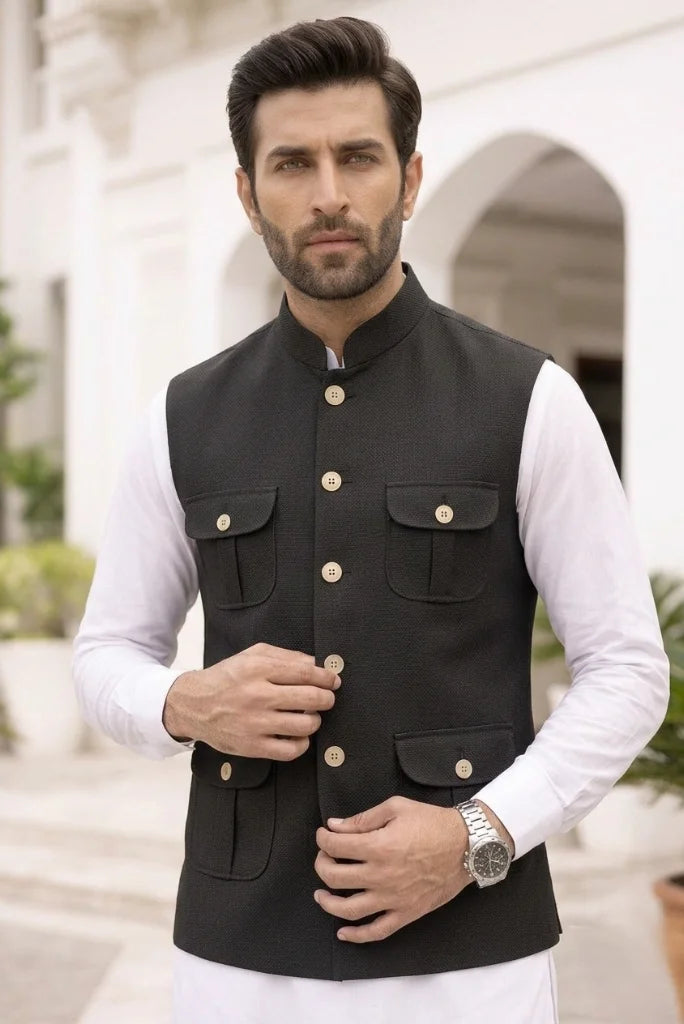 Black_rajasthani_jacket_band_collar_close-up_and_four_flap_pockets_Front