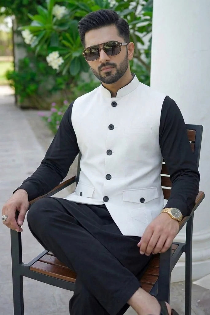 Close-up of white Nehru jacket with black button detailing