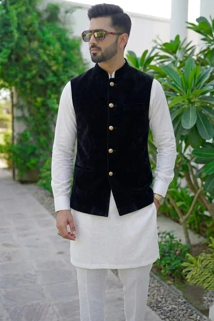 Man wearing black velvet Nehru collar waist coat front view