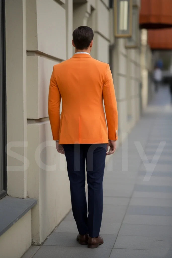 Men’s orange blazer styled for wedding and festive celebration-back