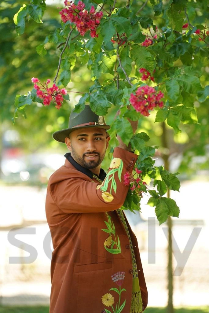 Men rust two piece suit with intricate embroidery work