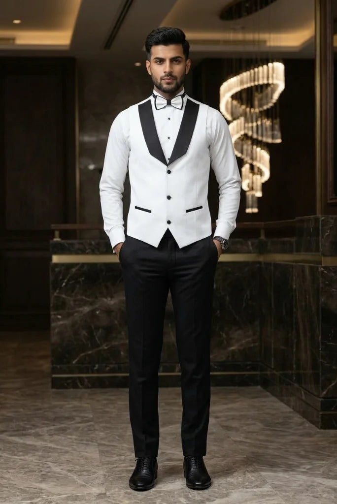 Men’s white tuxedo vest styled with black trousers and bow tie for an elegant formal look front view