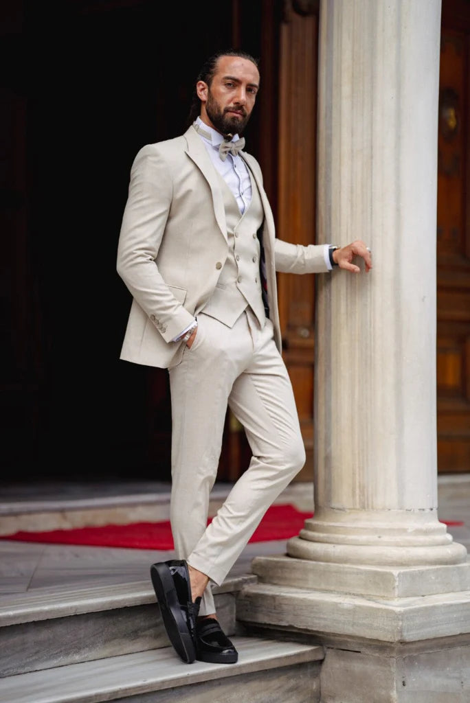 Couture men’s cream suit set for reception events