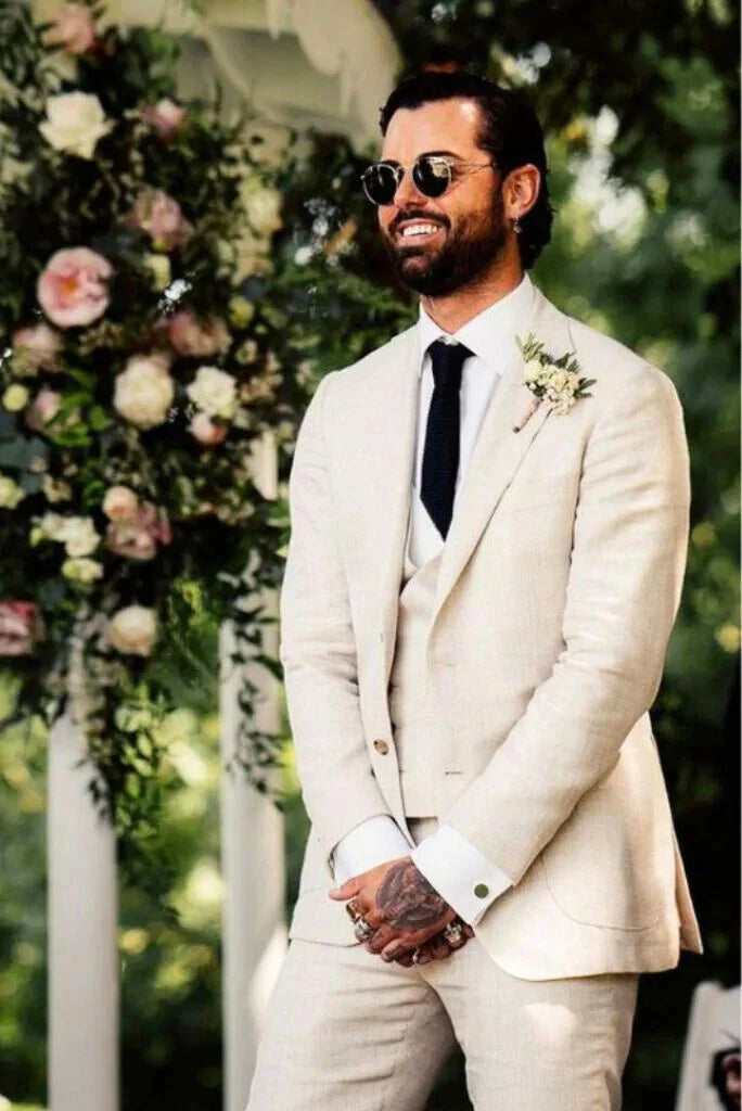 Men’s beige three piece suit for wedding reception wear