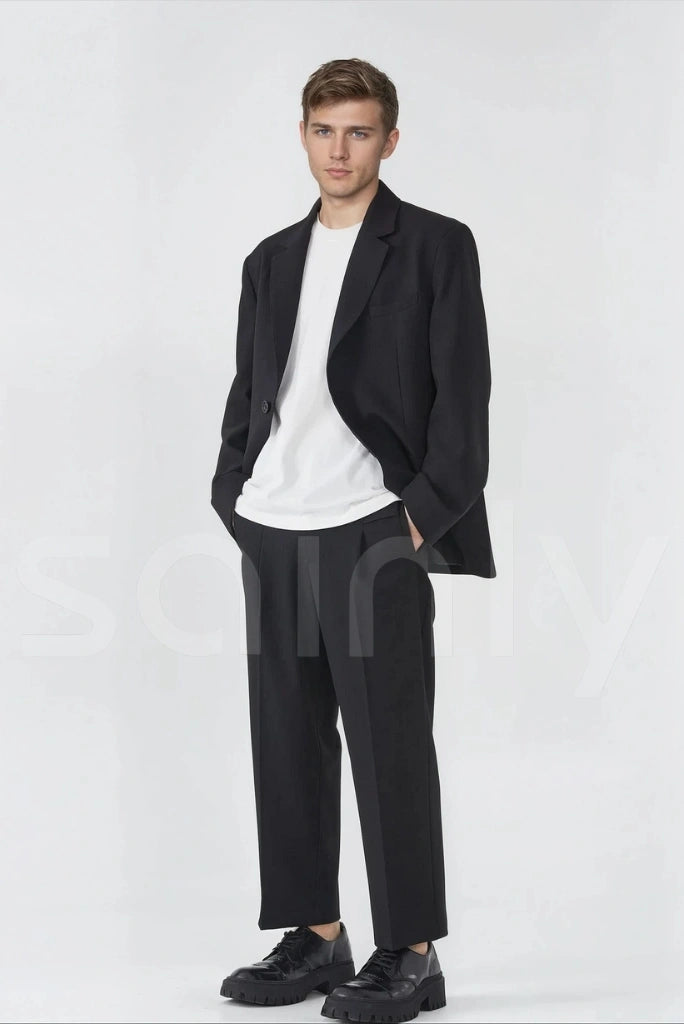 Men’s black pleated front pants with zip-fly closure and belt loops-side