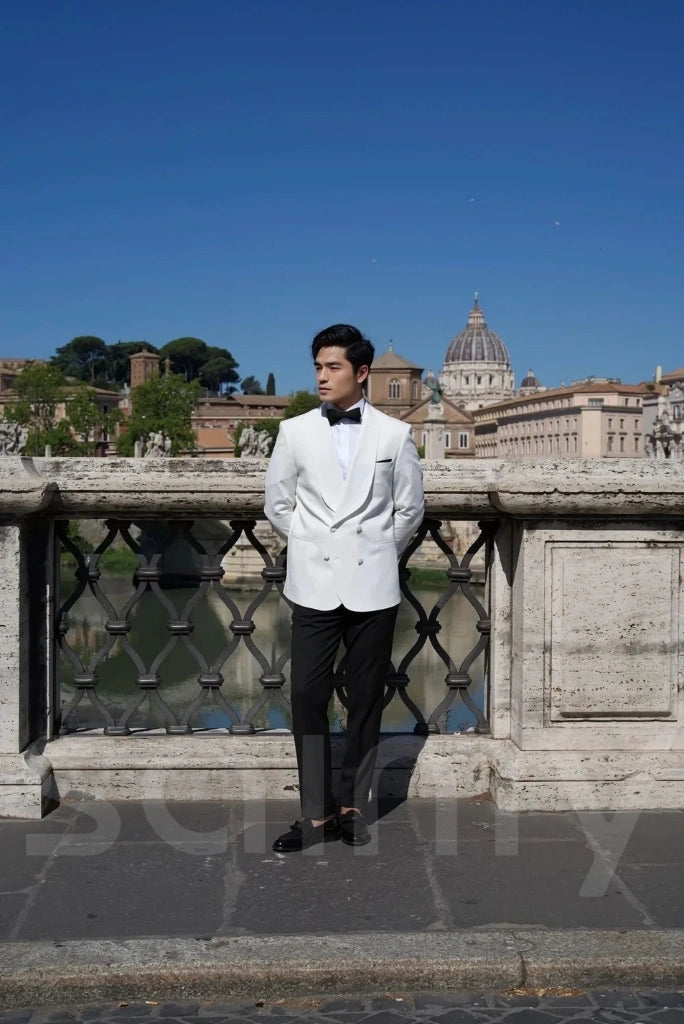 Chic white double-breasted suit with a modern silhouette-front