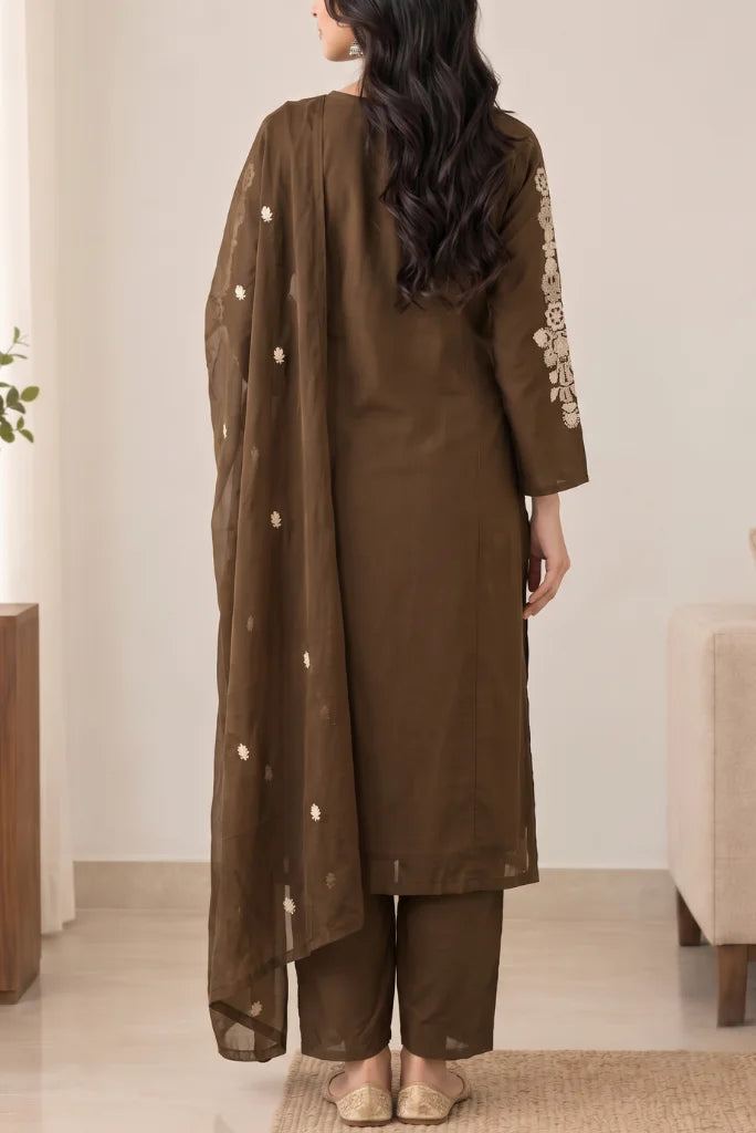 Woman wearing chocolate brown embroidered kurta pant set with sheer dupatta, back look