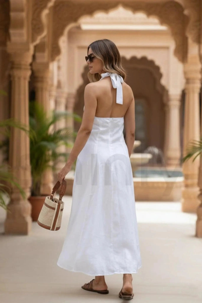 Sleeveless white halter neck maxi dress with flowy silhouette-back