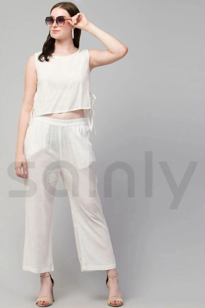 Stylish women white linen crop top with matching trousers