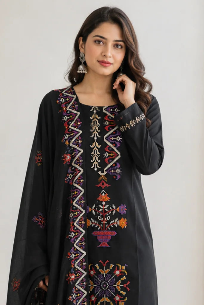Close-up of multicolour cross-stitch placket and neckline on black kurta